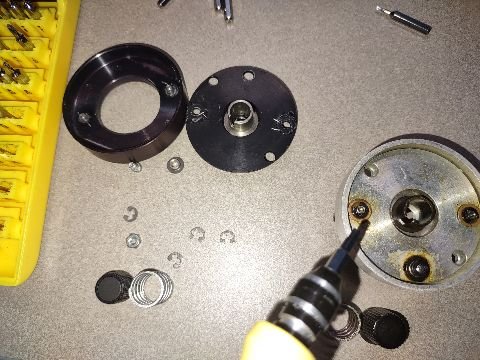 A few extra washers can be seen on the Leitz, but even the E clamps are identical