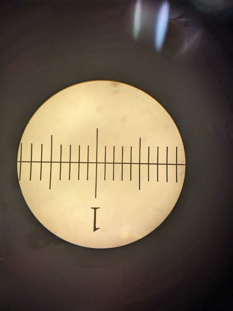 AO  cat.#  176A eyepiece  18.3 mm f.o.v. Correct forbthe optical system it is in but not perfect for a plan objective. A bit of curvature.