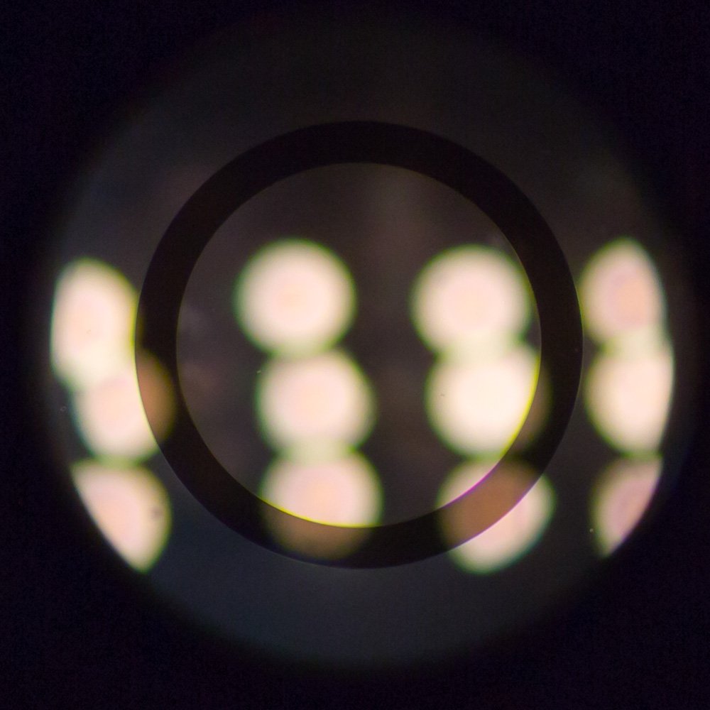 10x objective pinholes out of focus