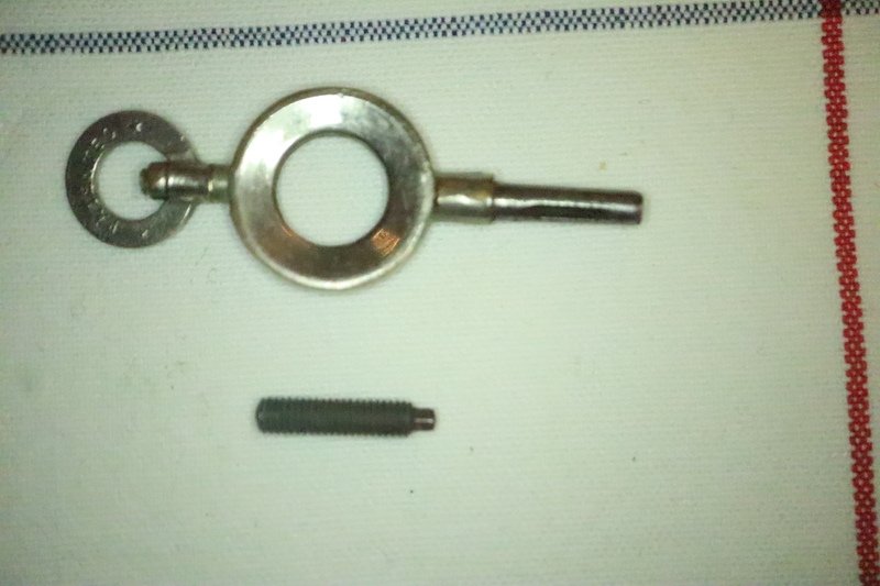screw and pocket watch key